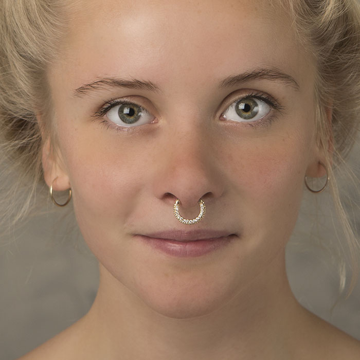 Vergulde septumclicker met steentjes
